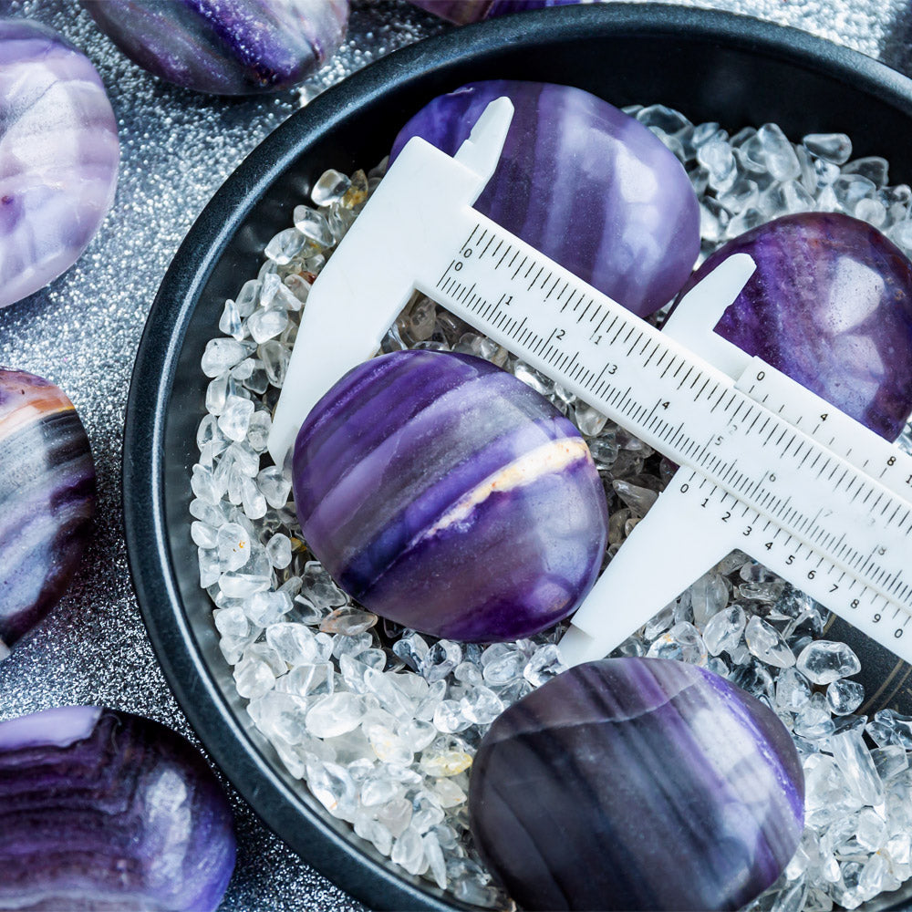 Silk fluorite palm stone