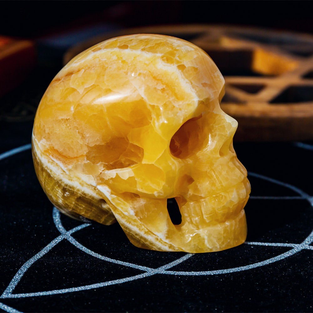 3.5" Hollow Out Orange Calcite Skull