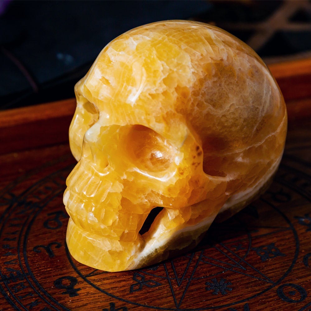 3.5" Hollow Out Orange Calcite Skull