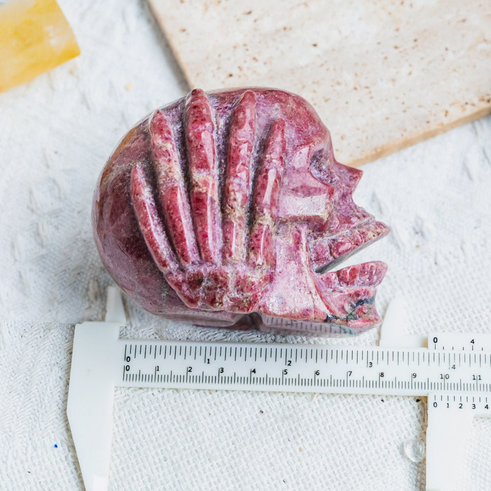 Rhodonite Skull (Hear no evil)