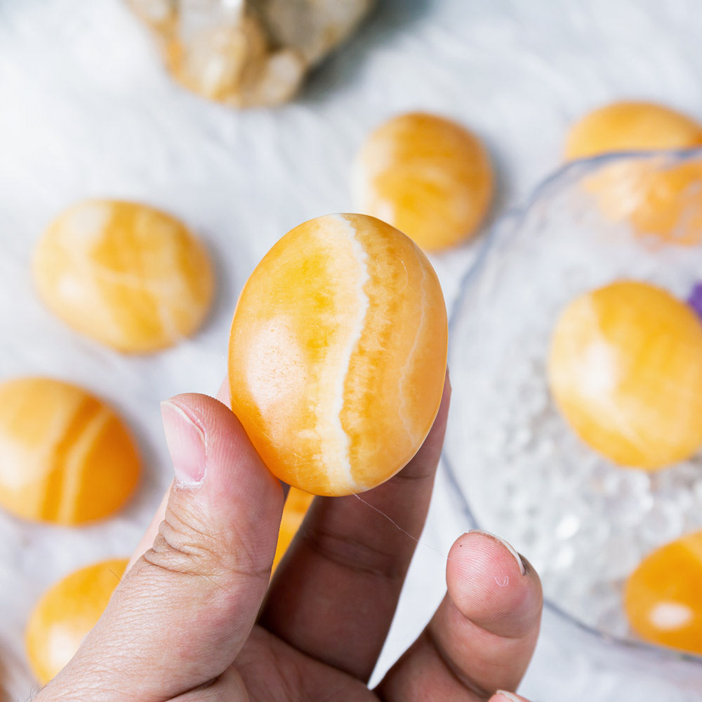 Orange Calcite Palm stone