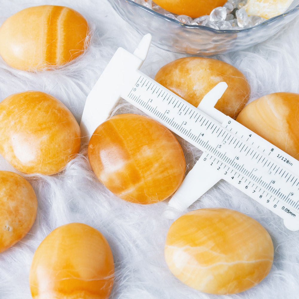 Orange Calcite Palm stone