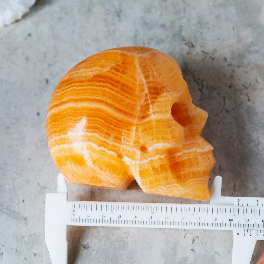 Orange calcite skull